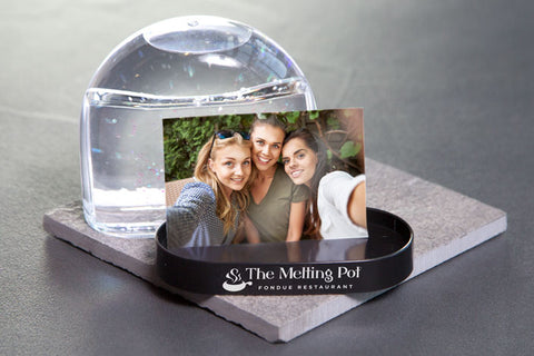 Snow Globe on Table with Inserted Photograph